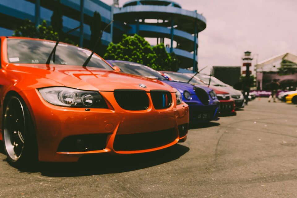 Photo by Rangga Aditya Armien: https://www.pexels.com/photo/cars-parked-outside-on-concrete-road-235222/